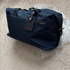 TUMI Navy Duffel Bag